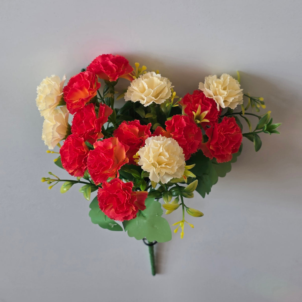 Orange artificial mini carnation flower bunch - close-up